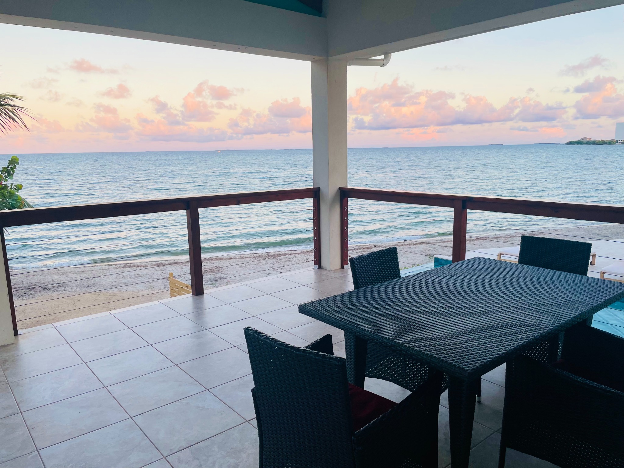Covered beachfront balcony overlooking the Caribbean